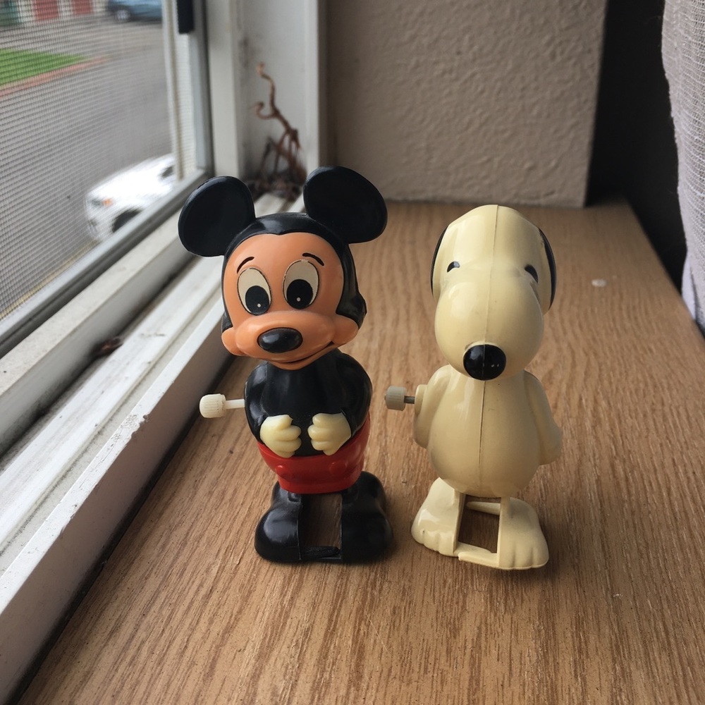 Vintage 1966 snoopy and 1977 Mickey Mouse wind up toys